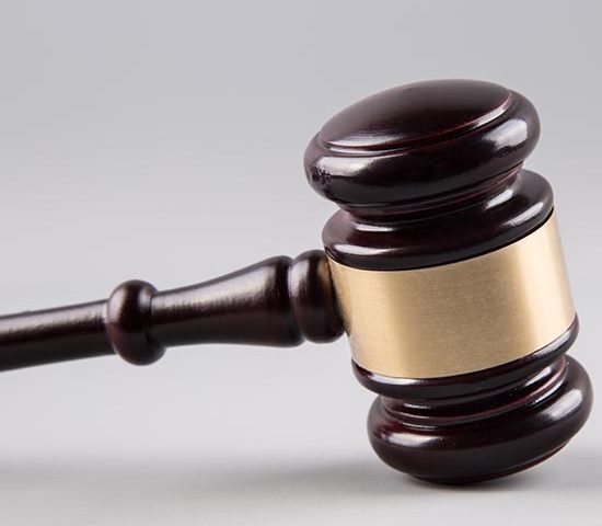 A gavel on a white background.